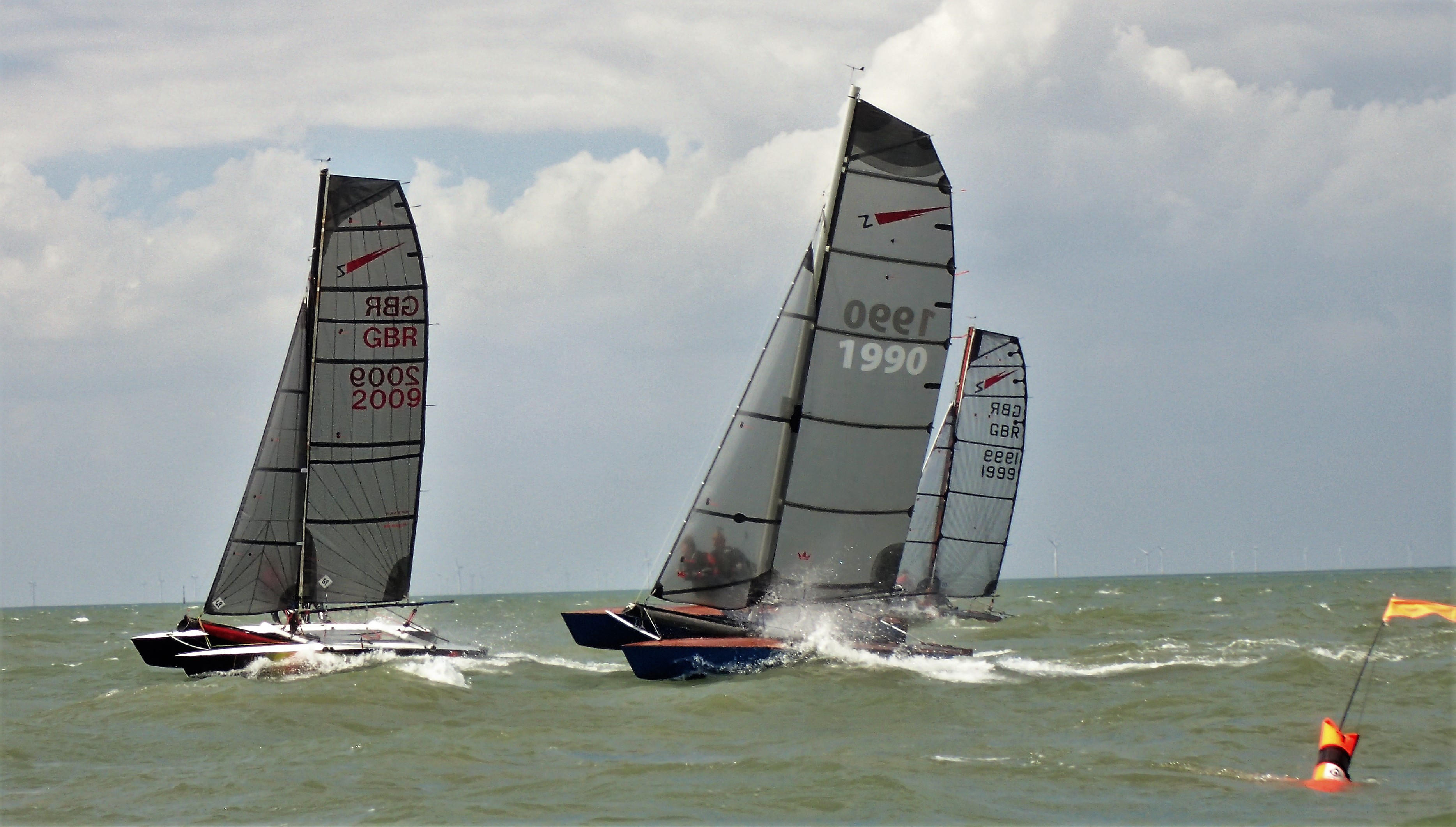 Club boats on the water